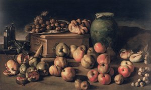 Natura morta con frutta e scatola di cioccolatini